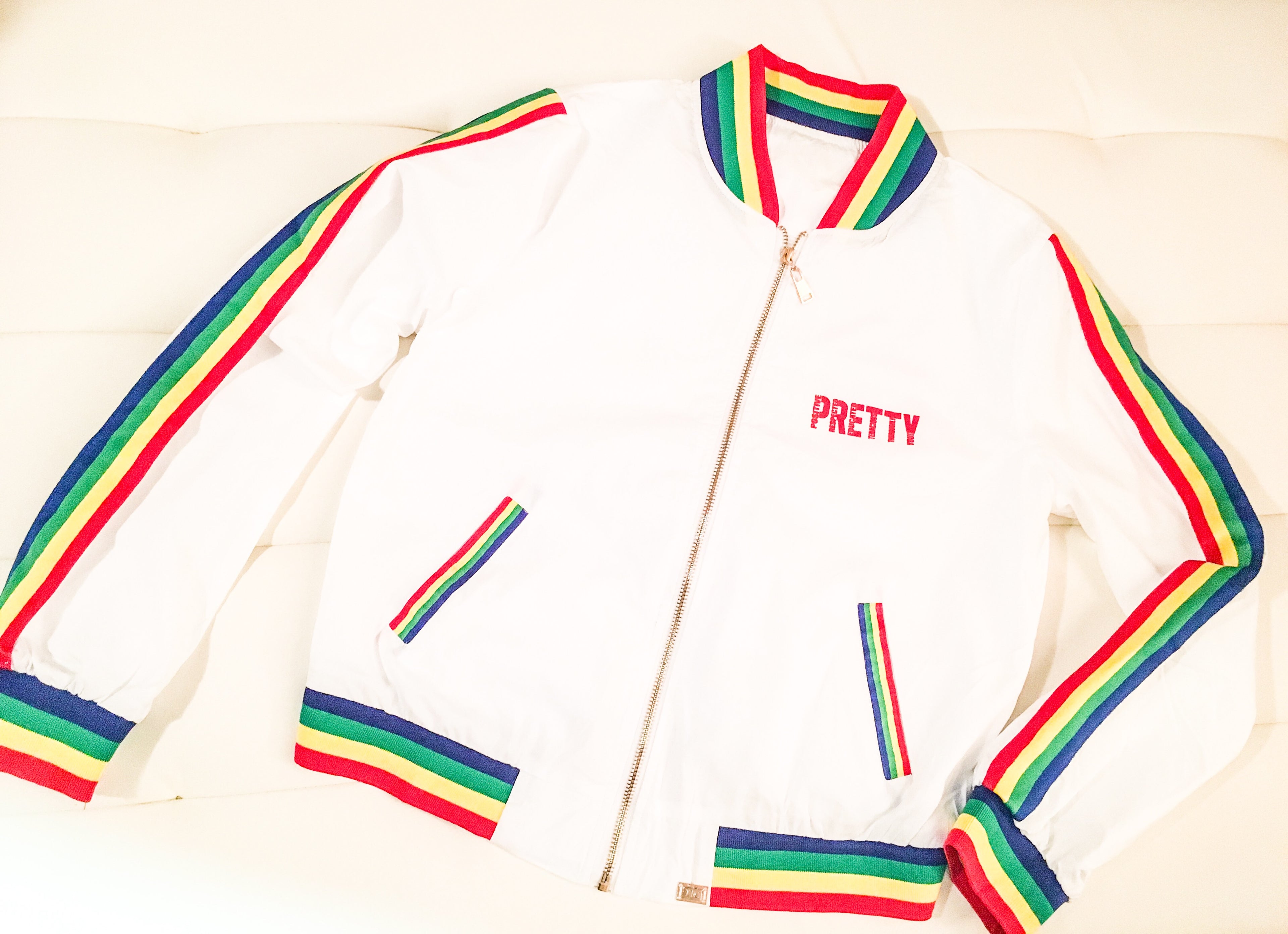 "P.R.E.T.T.Y." Rainbow striped bomber jacket